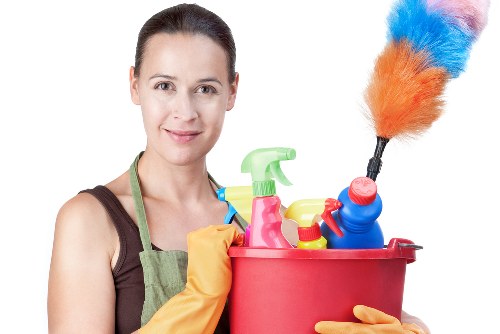 Curtain cleaning in a bright living room with fresh window treatments